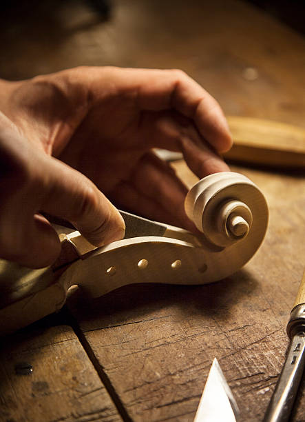 hand made violin using dremel tool for carving