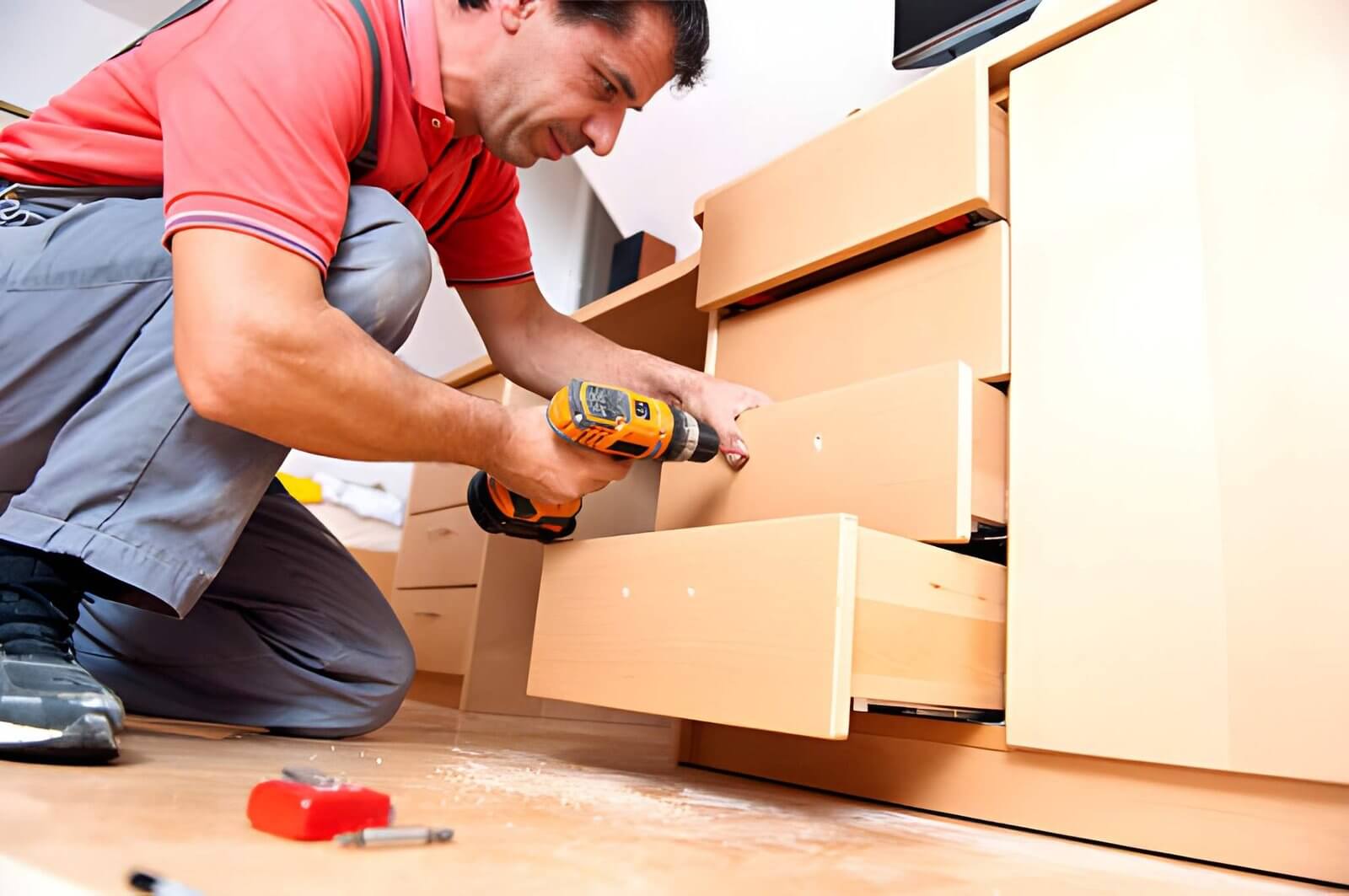 man buiding a dresser