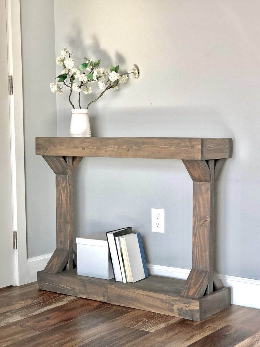 Rustic narrow farmhouse console with angled decorative supports