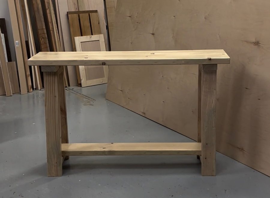 Homestead console table with angled legs and lower shelf