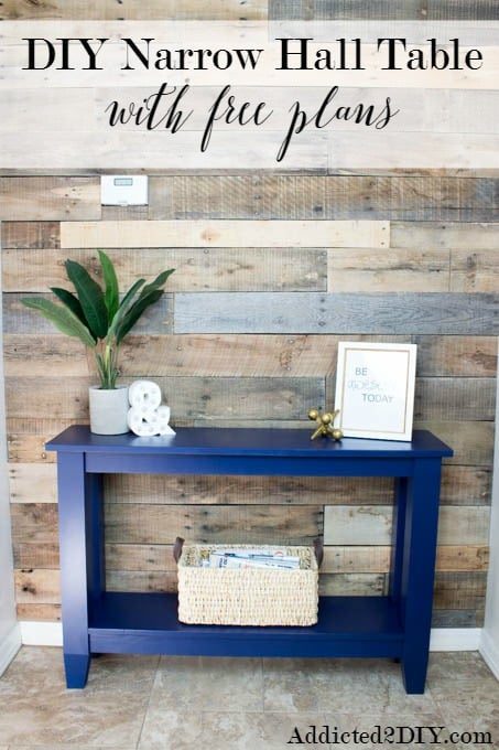 Blue narrow hallway table with tapered legs and lower shelf