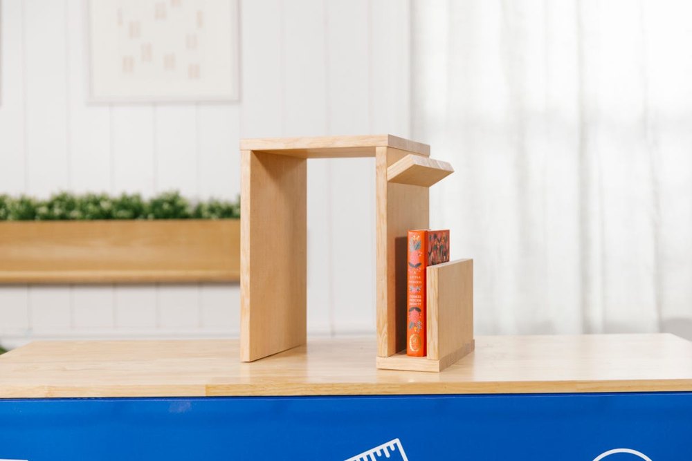 Wooden sofa arm console with an attached side shelf