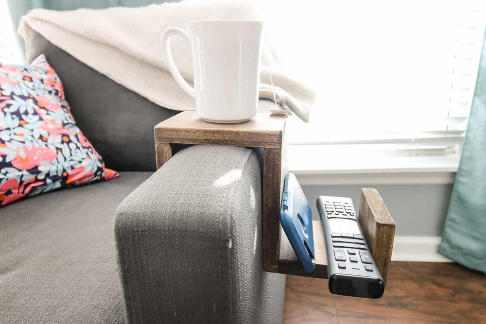 Sofa arm drink platform with a remote caddy